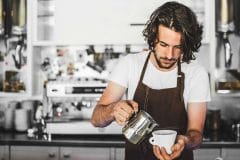 barista making coffee