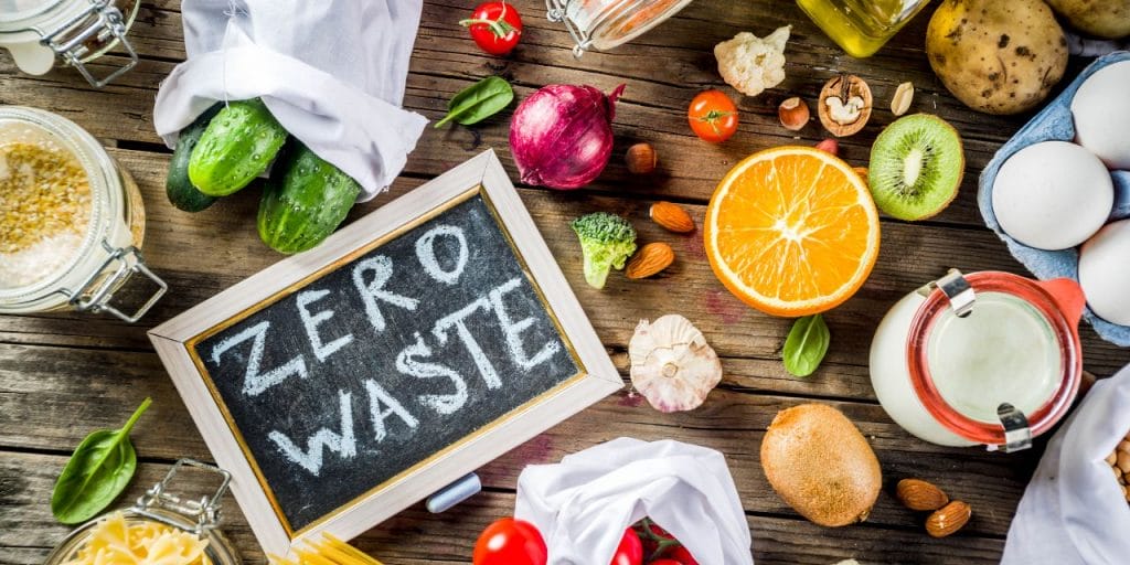 fruits, vegetables and a small board saying 'zero waste'