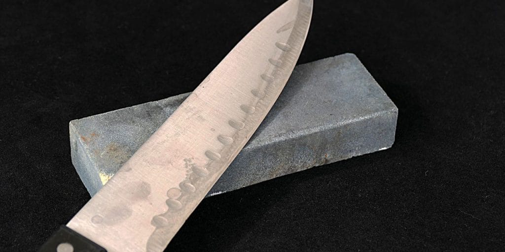 knife and a sharpening stone