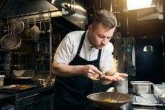 pastry chef preparing elegant desert