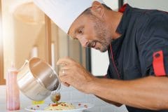 private chef preparing pasta