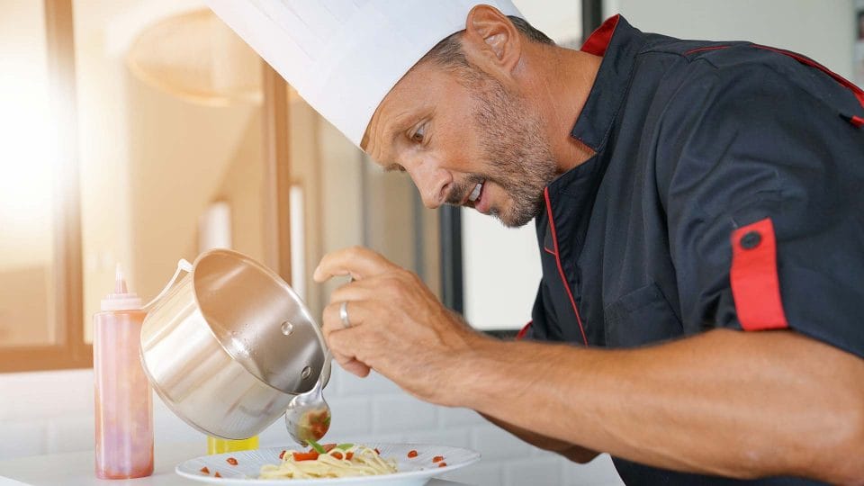 private chef preparing pasta