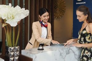 receptionist welcoming guest