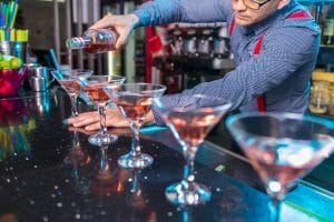 bartender pouring cocktails