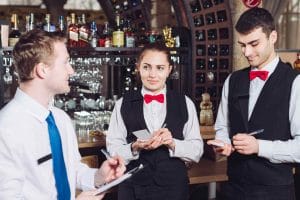 floor manager talking to front of house staff