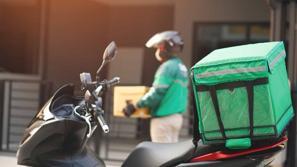 food delivery driver on scooter